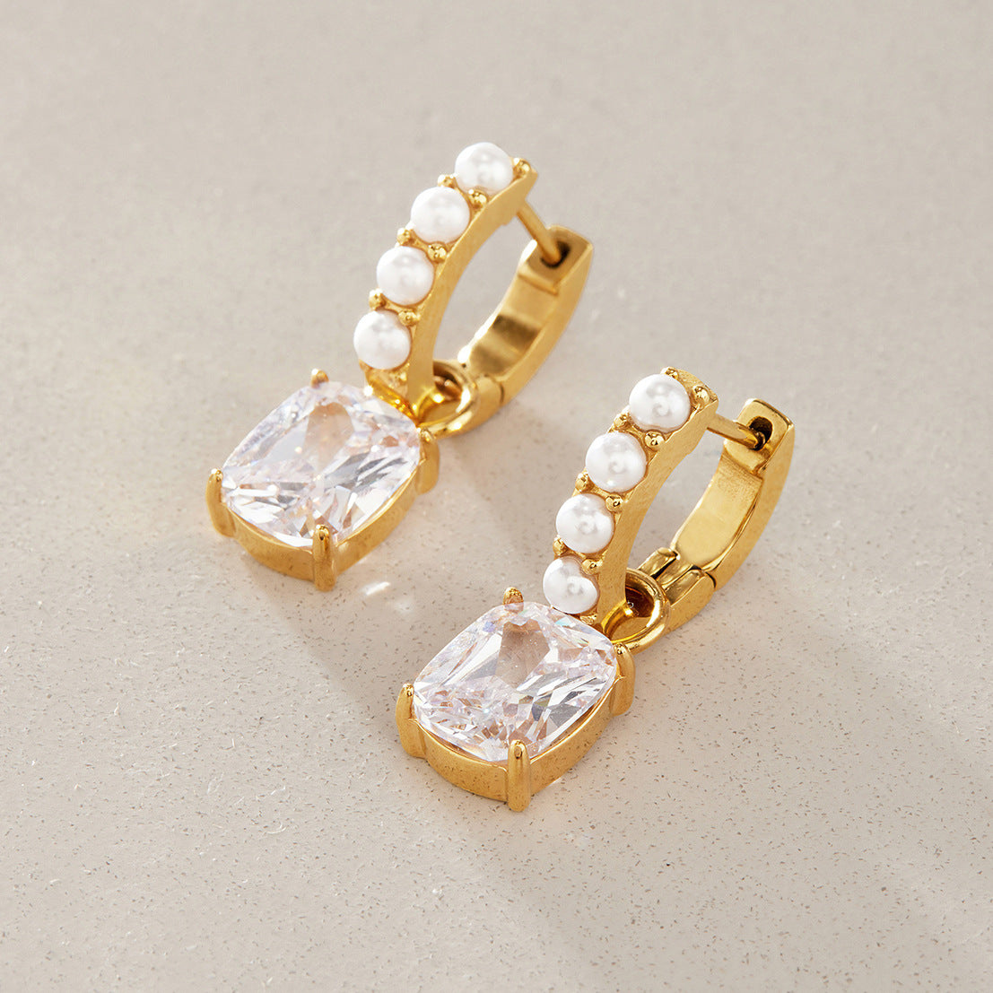 Pair of gold tone pearl-look drop hoops