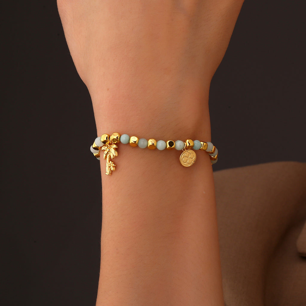 model wearing the palm tree beaded bracelet