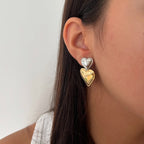 Stainless Steel Double Heart Stud Earrings in Three Finishes styled product view