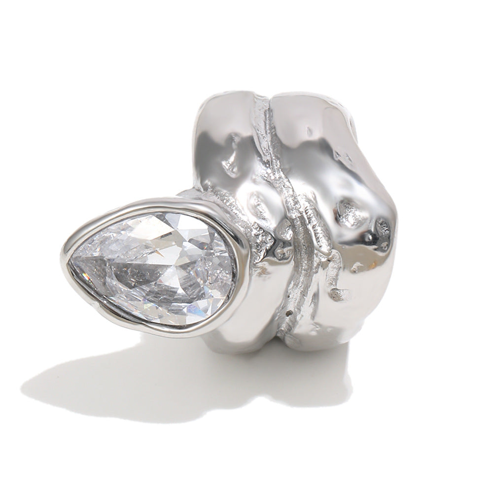 close view of silver-finish sculptural pear-cut statement ring