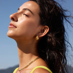 Rounded teardrop earring shown in side profile