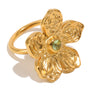 isolated gold plated stainless steel flower ring with rippled petals