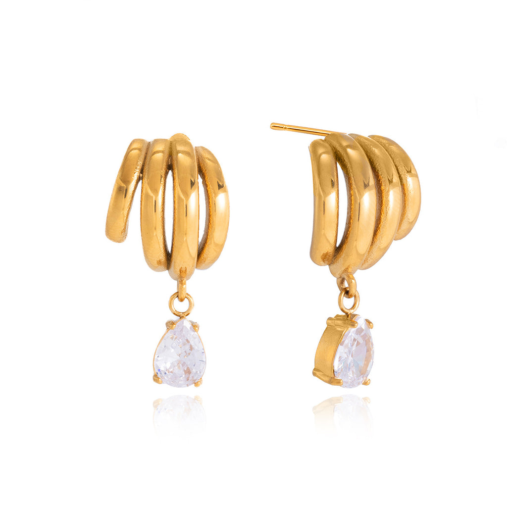 Curved loop earrings with clear pear-shaped drops on white