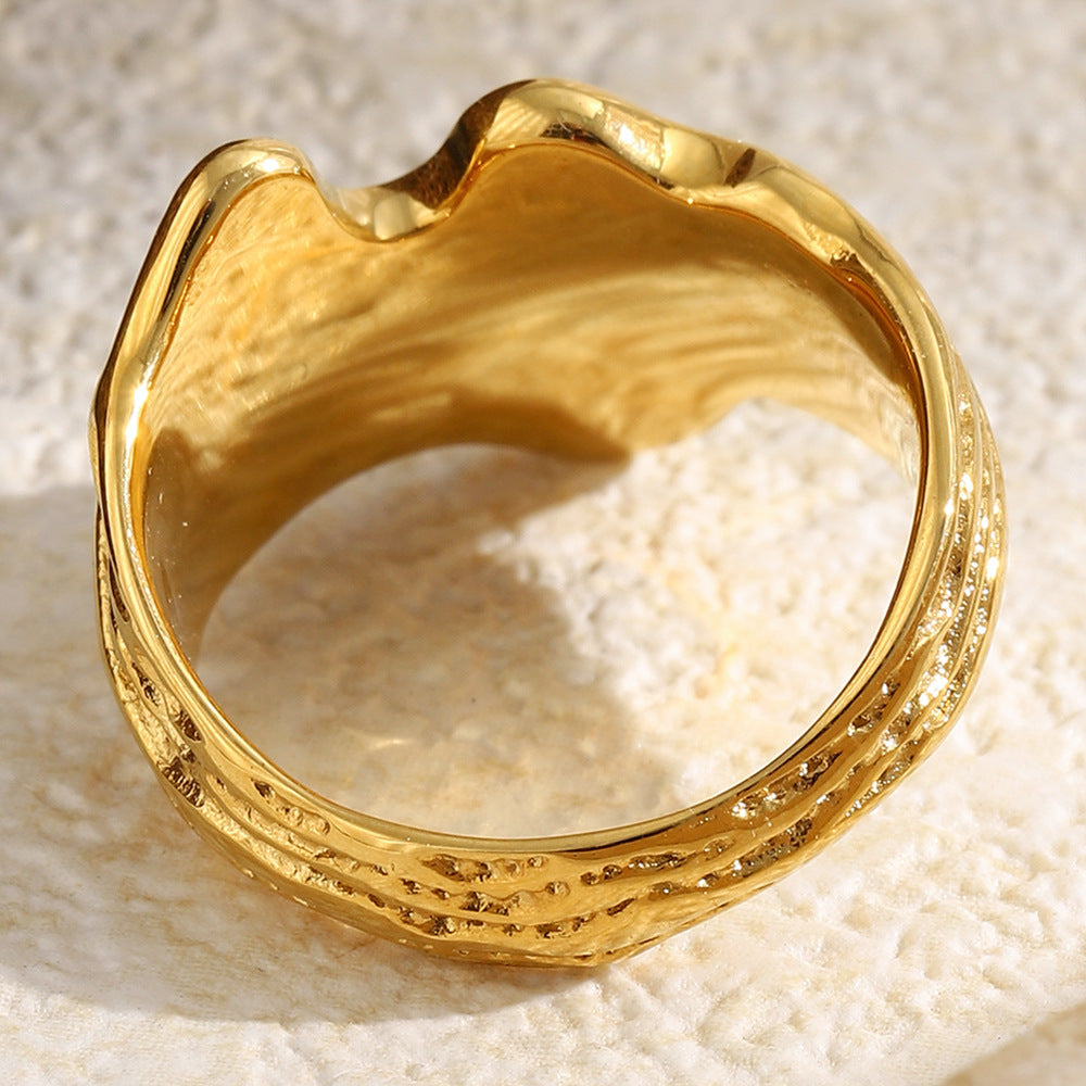 rear view of the wide gold plated topographic statement ring