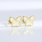 pair of gold plated butterfly studs with circular scale texture