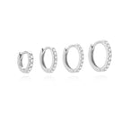 clean isolated view of four 925 silver moissanite huggie sizes