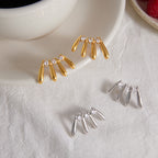 Two finishes of elongated drop fan earrings