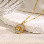 gold plated bee on a silver-finish round medallion necklace