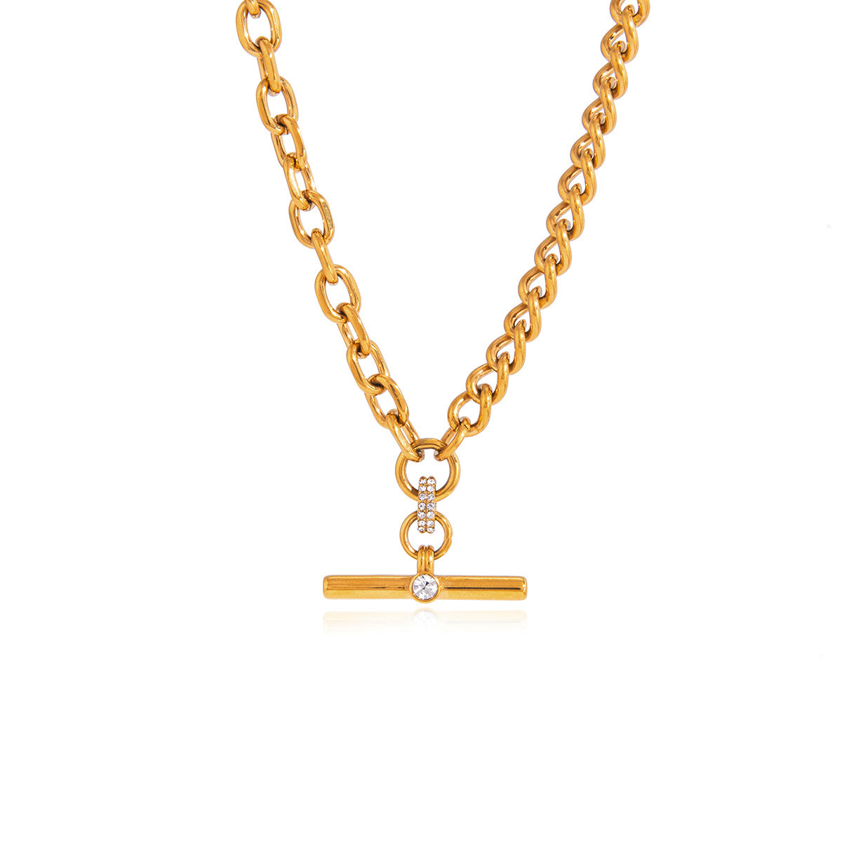 Gold-tone T-bar necklace laid on white
