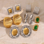 Large geometric studs and ribbed designs arranged on pale stone