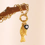 gold plated fish charm cluster on a front spring-ring clasp