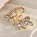 front view of gold plated and silver-finish double flower open ring