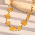 Gold Plated Stainless Steel Spiral Disc Station Necklace — worn view