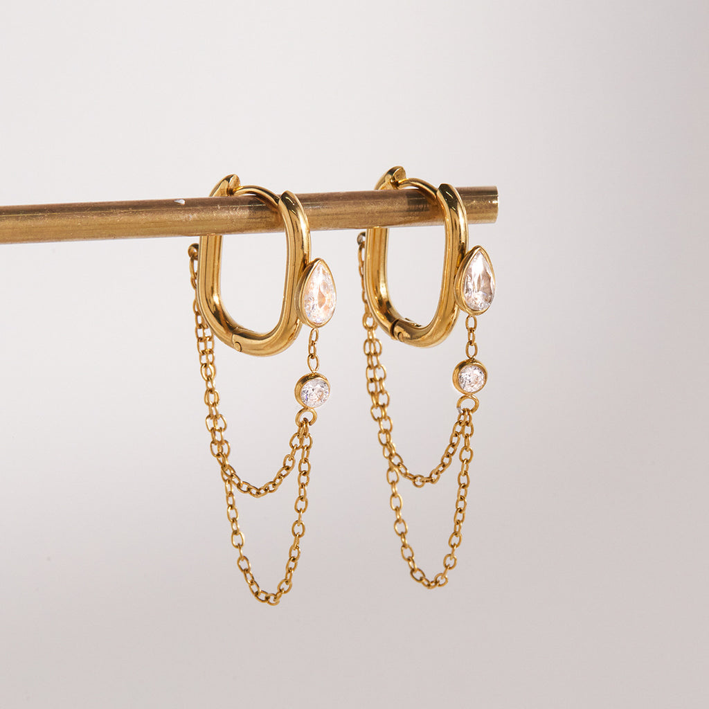 pair of stainless steel hoops with two graduated chain drops