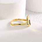 side profile of raised lotus leaf face on a slim band