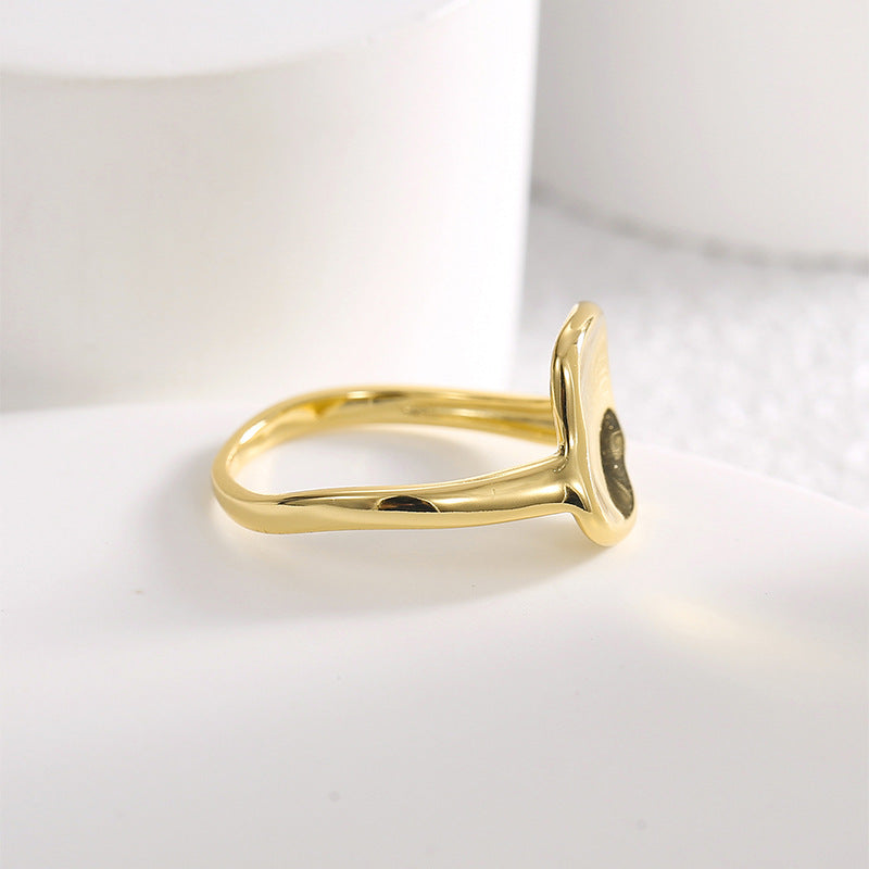 side profile of raised lotus leaf face on a slim band
