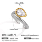 Silver tone split-band ring with gold tone stone setting