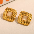 gold plated woven square studs with beige cat's-eye centers