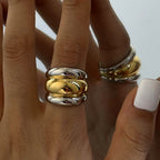 Two-Tone Stainless Steel Sculptural Ring Collection — styled view