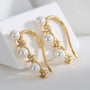 gold plated shell pearl and zirconia ear climber pair