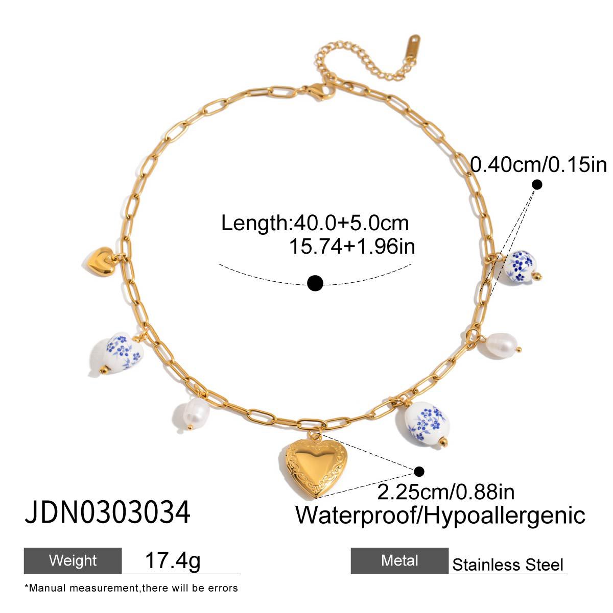 Heart and white-bead charm necklace
