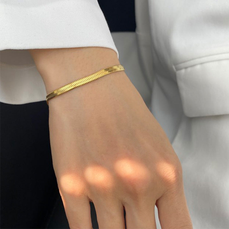 Gold Plated Stainless Steel Chain Bracelet Collection — herringbone bracelet worn view