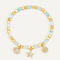 aqua and white beaded bracelet with shell and starfish charms