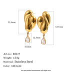 Gold tone sculptural earrings with drop dimensions
