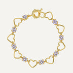 gold plated open heart link bracelet with clear zirconia on white