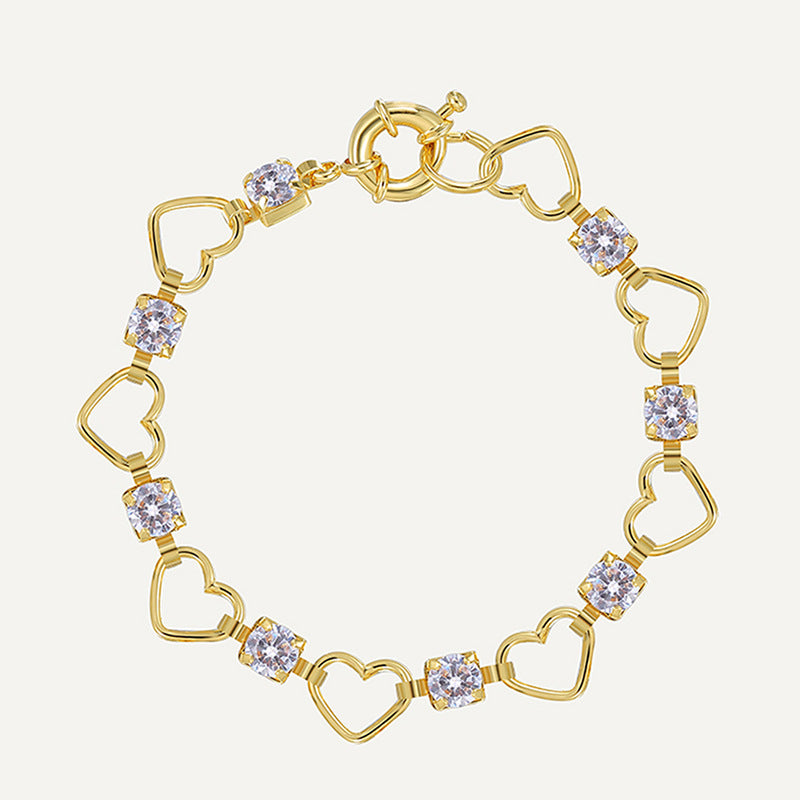 gold plated open heart link bracelet with clear zirconia on white