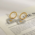 Two-Tone Heart Stainless Steel Drop Hoop Earrings – close-up view