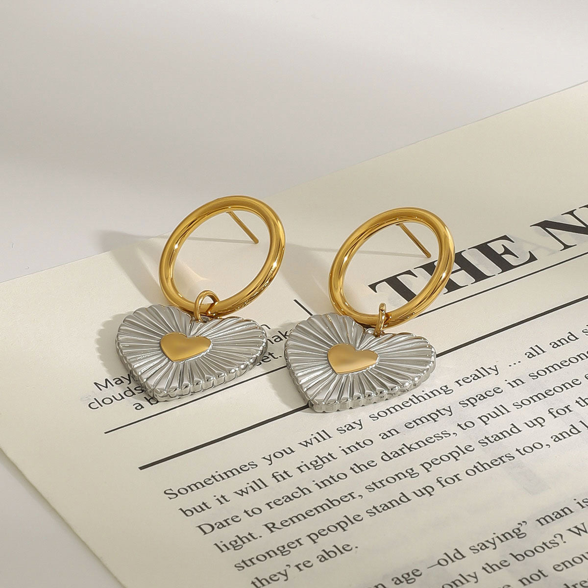 Two-Tone Heart Stainless Steel Drop Hoop Earrings – close-up view