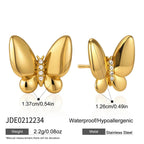 Polished butterfly studs with stone center