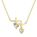 isolated 925 silver necklace with two stars and hanging heart stones