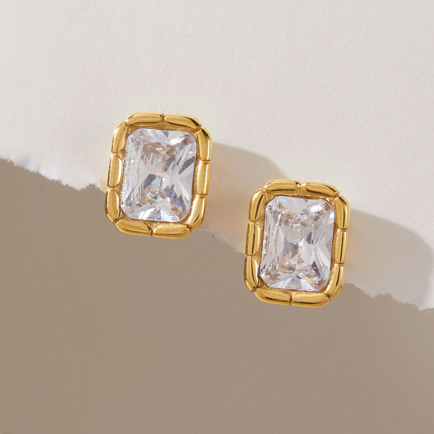 Rectangular zirconia studs with segmented gold tone frames