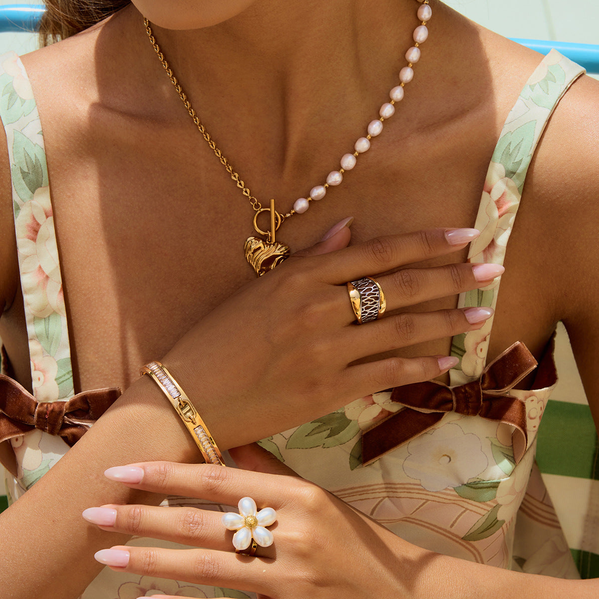 Gold-Tone Pearl-Look Heart Stainless Steel Necklace Collection – close-up view