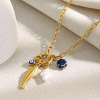 Gold plated stainless steel fish charm paperclip necklace front view