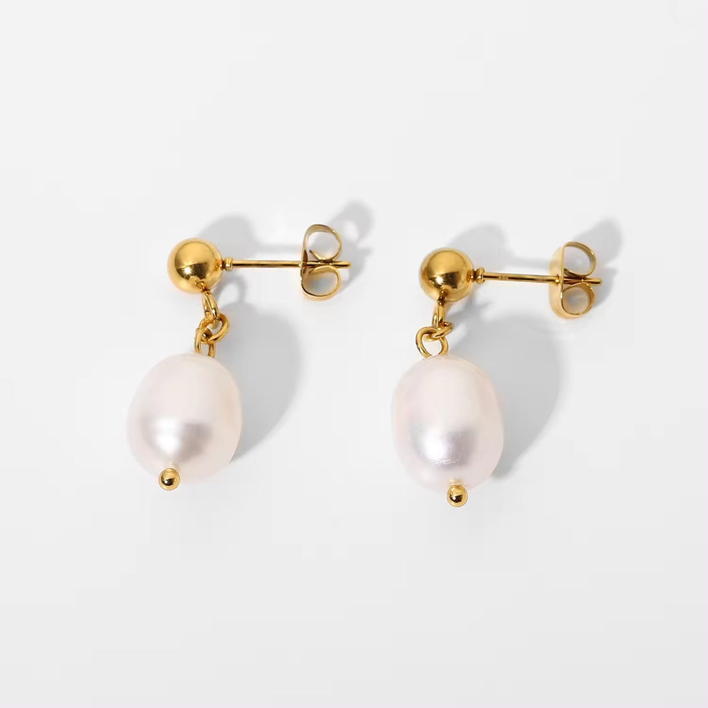 Minimal white bead drop stud earrings front view