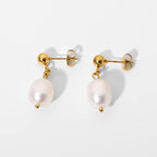Minimal white bead drop stud earrings front view