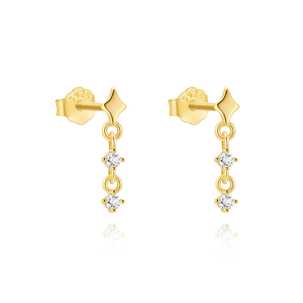 isolated gold plated star drop earrings with graduated zirconia accents