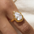 Gold plated pear stone ring worn close-up