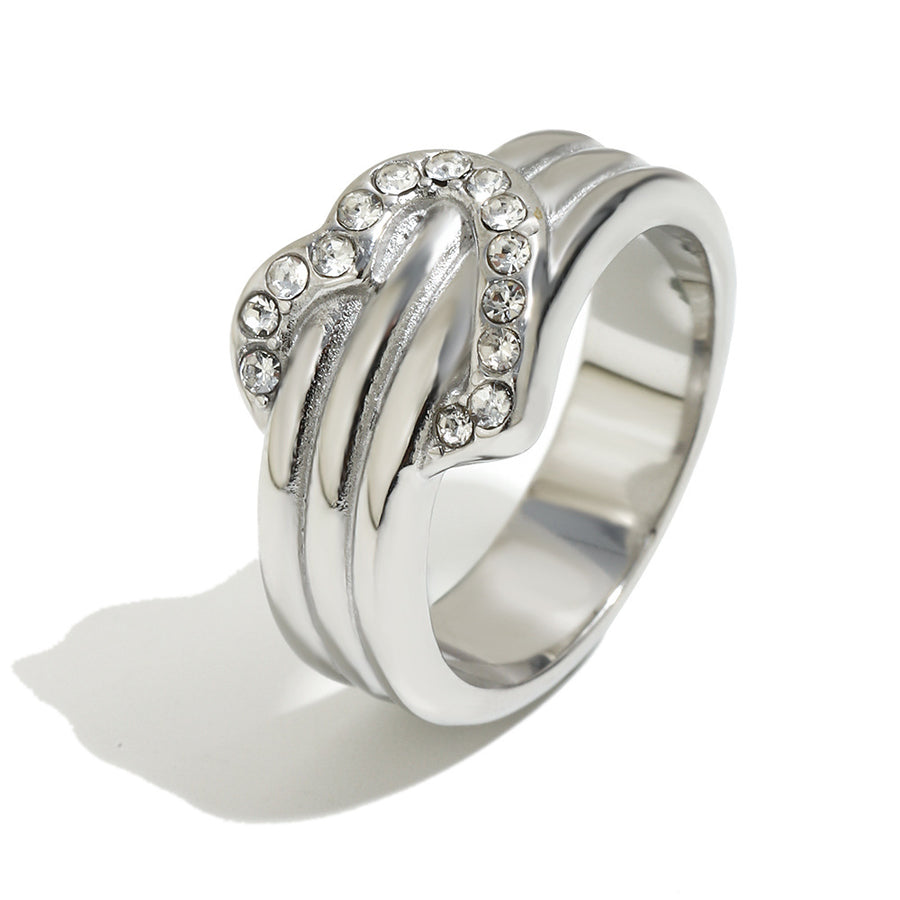 silver-finish pavé heart ring on a white background
