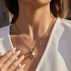 gold plated spiral sun freshwater pearl necklace worn on model