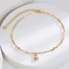 heart drop and clear stone station anklet on white display
