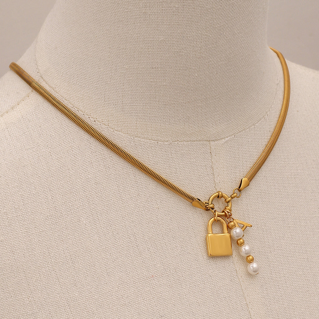 Gold-Tone Stainless Steel Lock Charm Necklace with Pearl-Look Drop — detail view