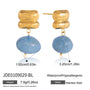 Blue resin bead earrings with measurement guide
