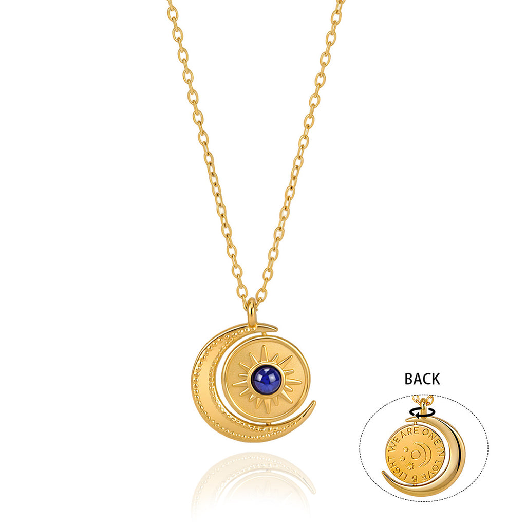 Sun disc necklace with inset view of decorated reverse