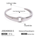 Polished central-detail cuff with size diagram