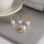 gold plated and silver-finish huggie earrings with white resin pearls