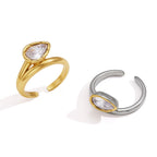 Front views of pear zirconia split-band rings